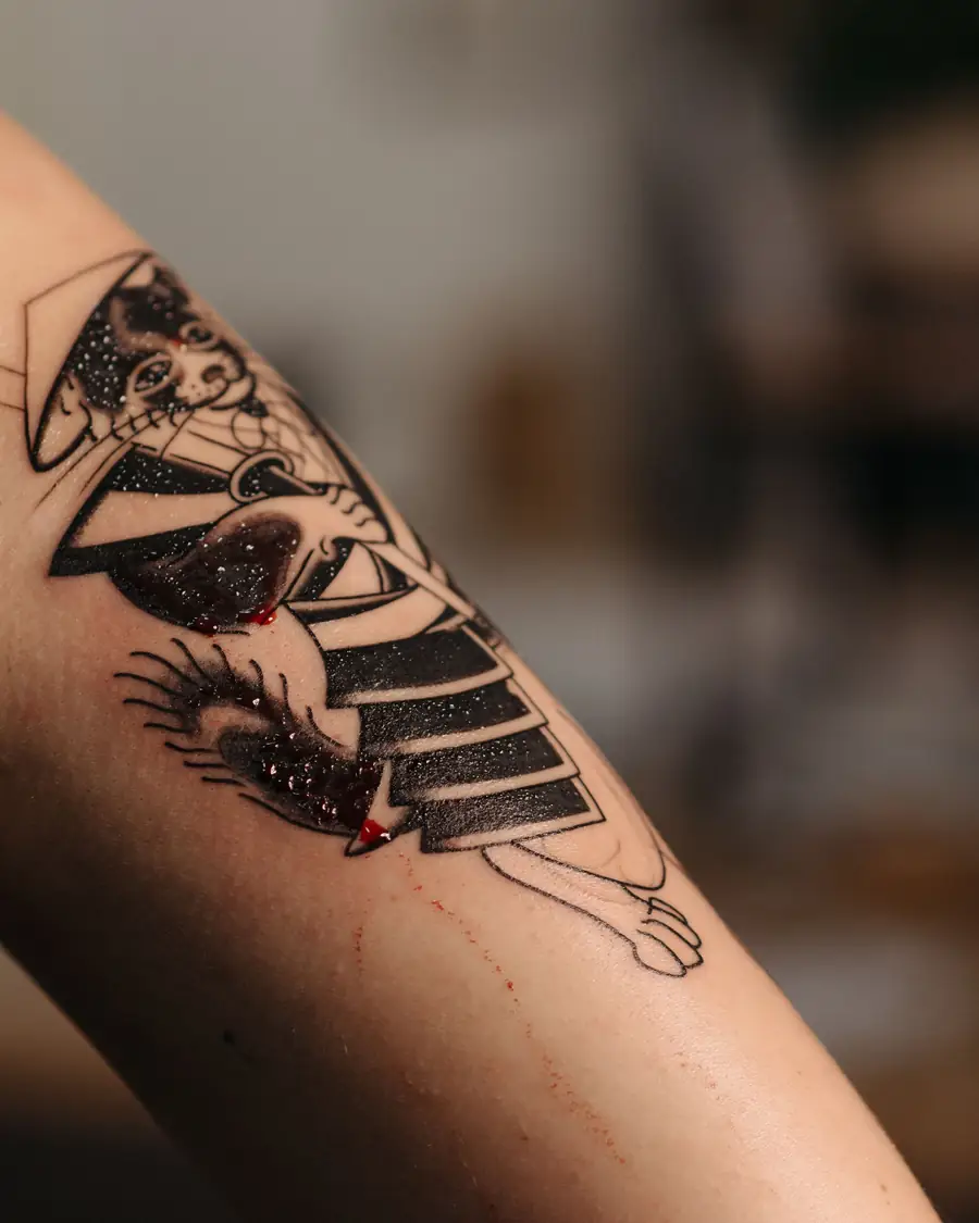 Graphic figure with solid black fills on the forearm